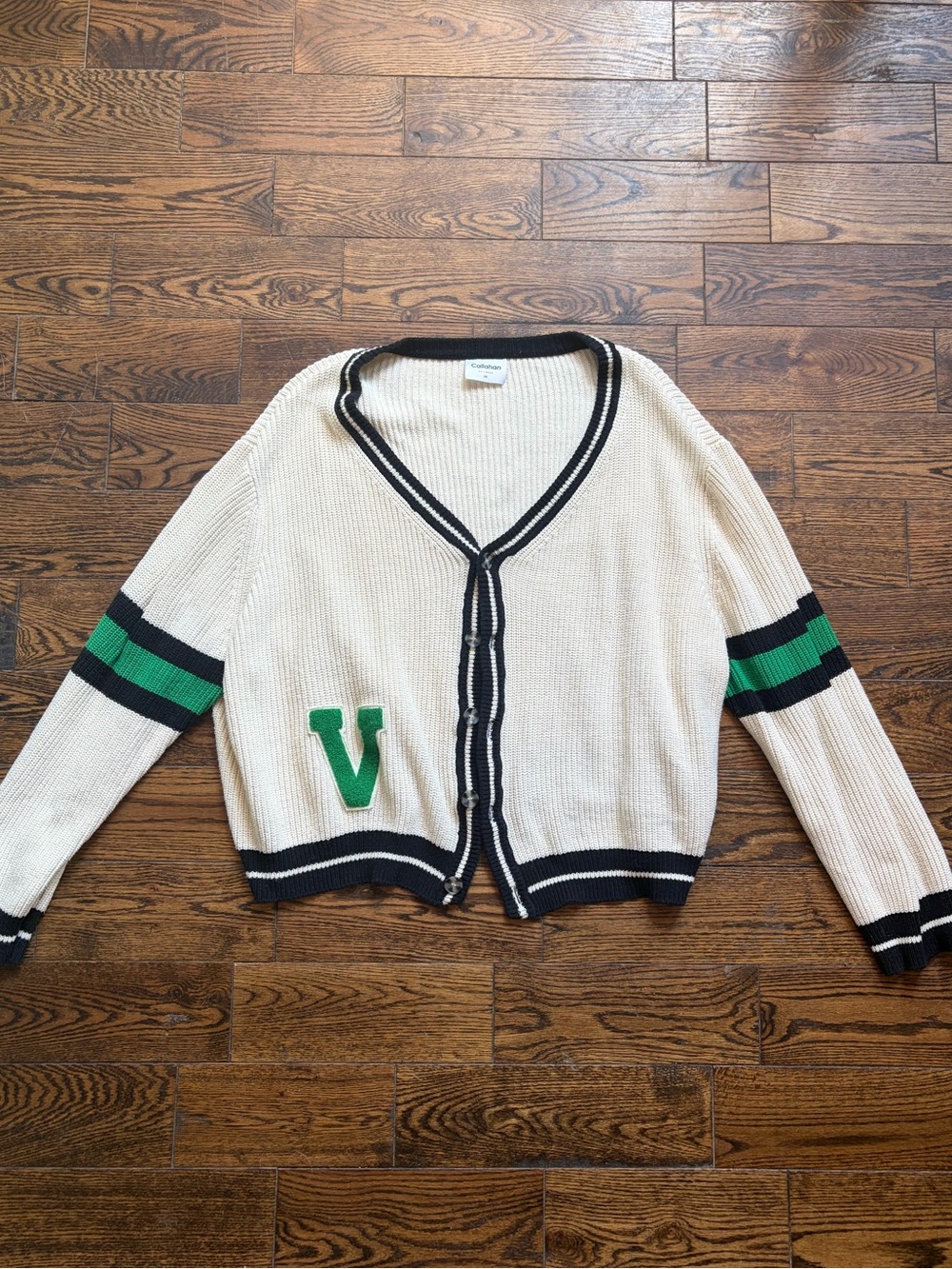 Callahan Cream Cardigan with Black Trim and Green Letter Patch